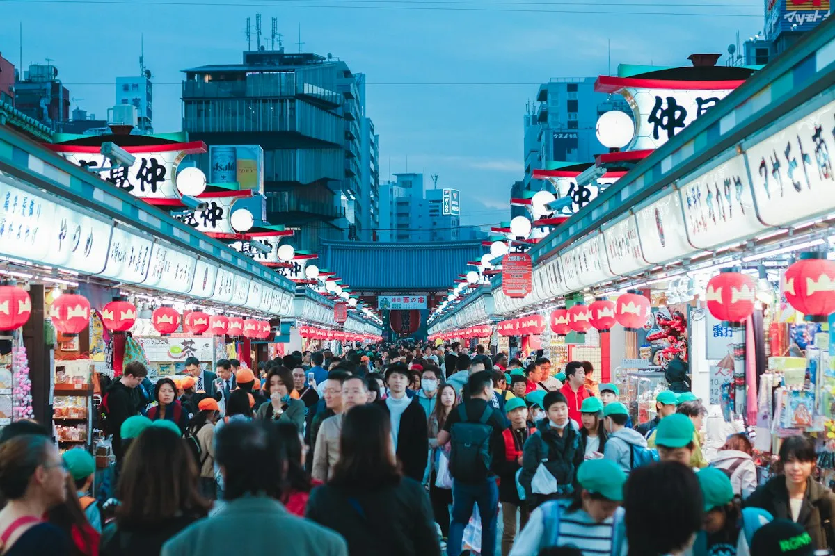 Nakamise-dori, the shopping street leading to Senso-ji in Asakusa, packed with visitors under red lanterns