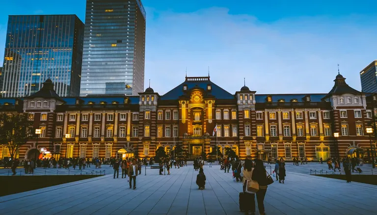 The red-brick Marunouchi building of Tokyo Station lit up at dusk