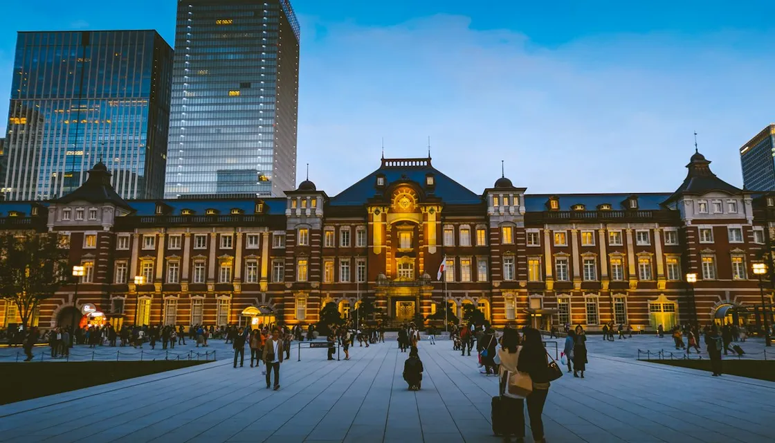 The red-brick Marunouchi building of Tokyo Station lit up at dusk