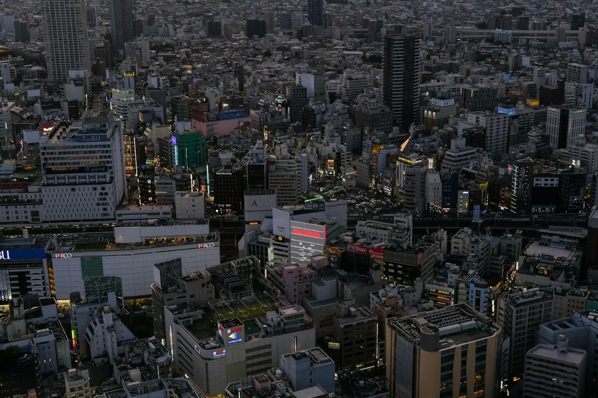 View over the area around Ikebukuro Station from Sunshine City, with department stores and dense blocks of buildings