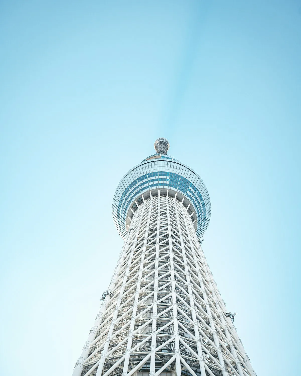 Looking straight up the steel lattice of Tokyo Skytree from near its base